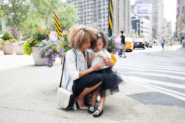 Mother with daughter in the street